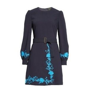 Zephyra Bluebell Embroidered Long Sleeve Dress. Embroidered sleeve